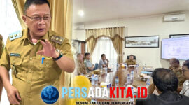 Wakil Bupati Konawe H. Syamsul Ibrahim memimpin rapat koordinasi Dewan Pengupahan dengan wajah serius, menekankan pentingnya percepatan pengusulan UMK, Selasa (18/11/2025).)