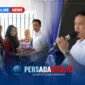 Bupati Konawe Utara, H. Ikbar, SH., MH., didampingi Ketua TP PKK, Hj. Wisra Wartawati Ikbar, menyerahkan secara simbolis paket intervensi gizi kepada salah satu perwakilan ibu hamil di Balai Desa Tondowatu, Kecamatan Motui, Kamis (18/6/2026).