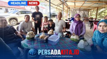 Bupati Konawe, H. Yusran Akbar, ST, tampak akrab menikmati suguhan es kelapa muda  di lapak UMKM milik M. Rizal sambil berbincang dengan  sejumlah pengunjung di area Inolobunggadue Central Park (ICP), Minggu (9/8/2026). Kunjungan ini menjadi bentuk dukungan nyata pemerintah terhadap pertumbuhan sektor UMKM di Bumi Konawe.