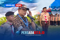 Bupati Konawe H. Yusran Akbar ST memimpin upacara pembukaan Kemah Bakti Wisata Bahari Bersahaja 2026 di Pantai Lalimbue, Soropia, Jumat (28/8/2026).