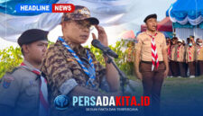 Bupati Konawe H. Yusran Akbar ST memimpin upacara pembukaan Kemah Bakti Wisata Bahari Bersahaja 2026 di Pantai Lalimbue, Soropia, Jumat (28/8/2026).