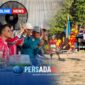 Bupati Konawe H. Yusran Akbar, ST menyaksikan tarian Mondotambe dengan atraksi Umo ara dan ketangkasan Tamalaki khas Suku Tolaki memukau ribuan penonton dari podium kehormatan saat pembukaan Porseni Kecamatan Anggaberi di Lapangan Tutuwi Motaha, Anggaberi, Selasa (25/8/2026) 