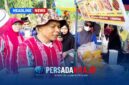 Suasana akrab Bupati Konawe H. Yusran Akbar saat bersama warga dan pedagang di stan UMKM Porseni Kecamatan Anggaberi, Senin (25/8/2026). Terlihat senyum dan canda tawa mewarnai interaksi di tengah keramaian lapangan.