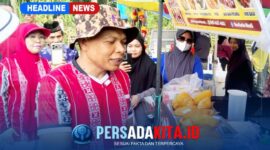 Suasana akrab Bupati Konawe H. Yusran Akbar saat bersama warga dan pedagang di stan UMKM Porseni Kecamatan Anggaberi, Senin (25/8/2026). Terlihat senyum dan canda tawa mewarnai interaksi di tengah keramaian lapangan.