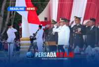 Suasana khidmat upacara penurunan Bendera Merah Putih di halaman Kantor Bupati Konawe, Senin (17/8/2026). Bupati Konawe, H. Yusran Akbar, S.T., bertindak sebagai Inspektur Upacara.